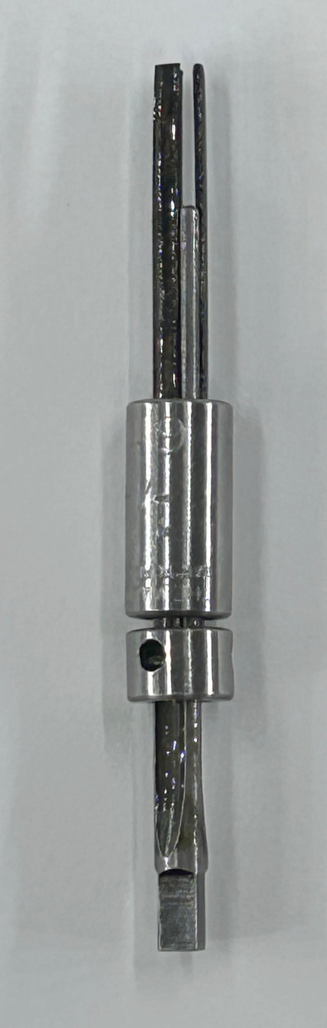 A metallic socket extension bar tool with a polished silver finish, shown vertically against a plain light gray background.